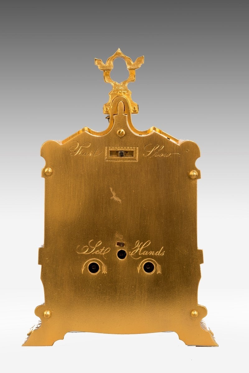 English engraved carriage clock. On the silver engraved dial is the maker and retailer Payne & Company, 163 New Bond Street. The gilt engraved case houses an eight day movement which strikes on a bell.