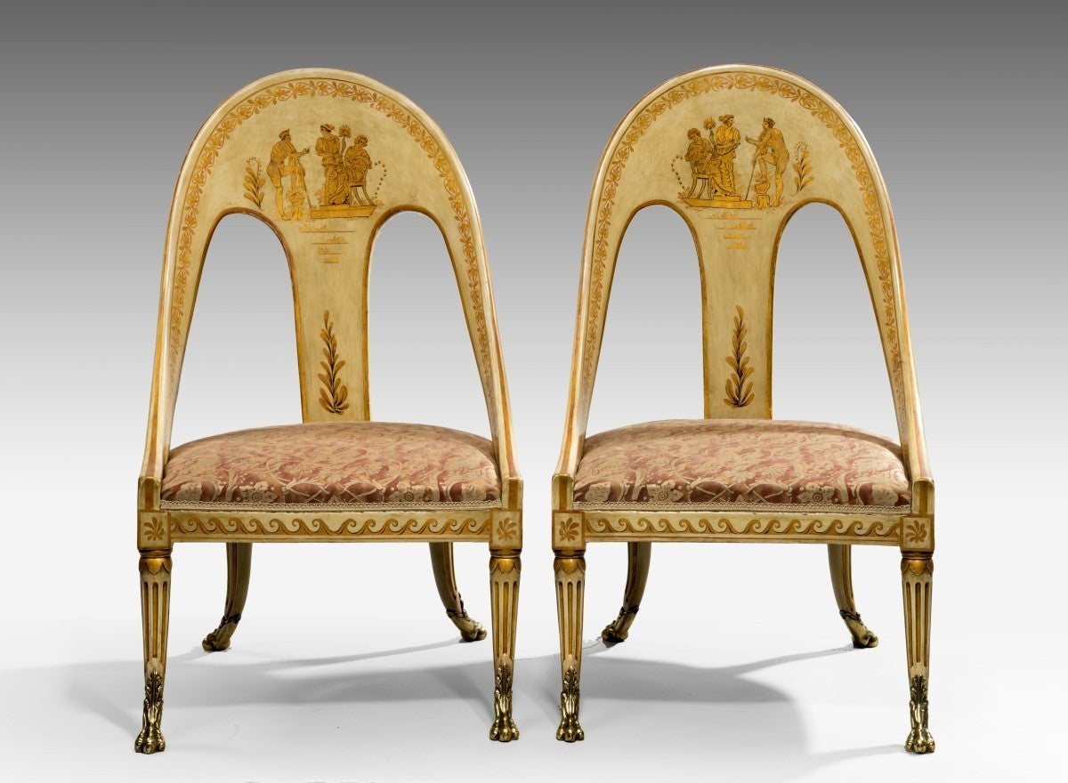 Very stylish pair of decorated Regency library chairs each stamped 'TR' on the underside of the seat rails.