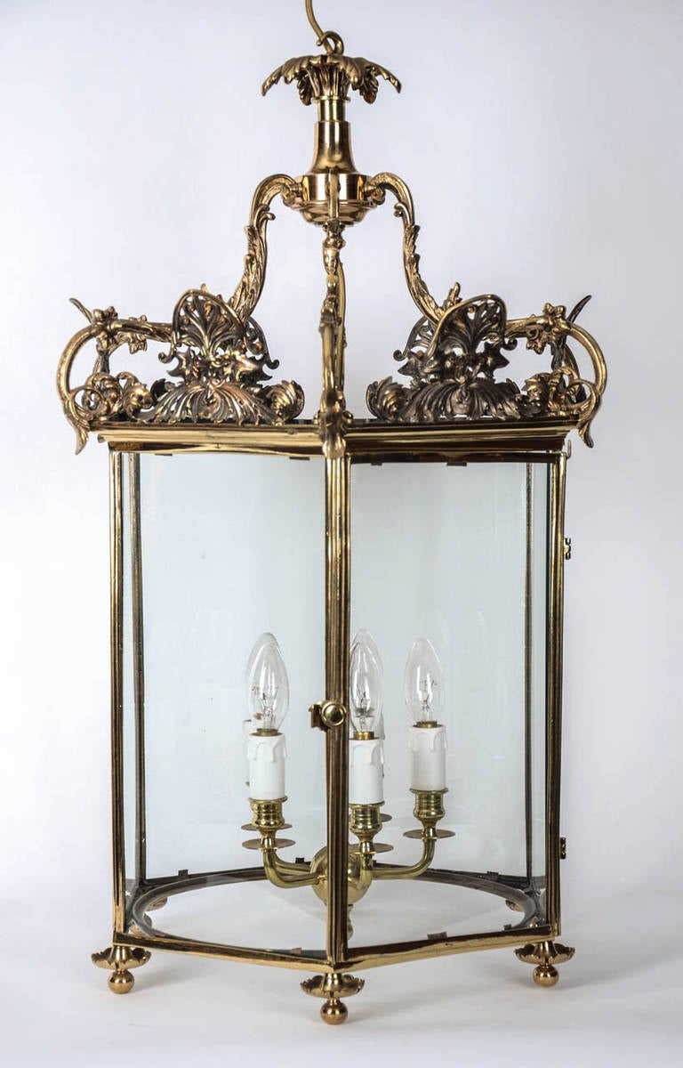 A superb 19th century brass hall lantern of large size with a single door. Modified for electricity