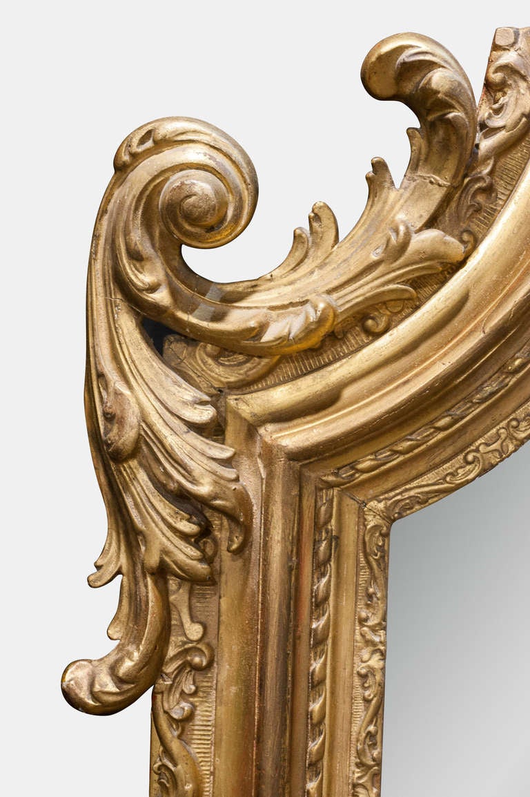A French 19th Century carved giltwood and gesso pier mirror