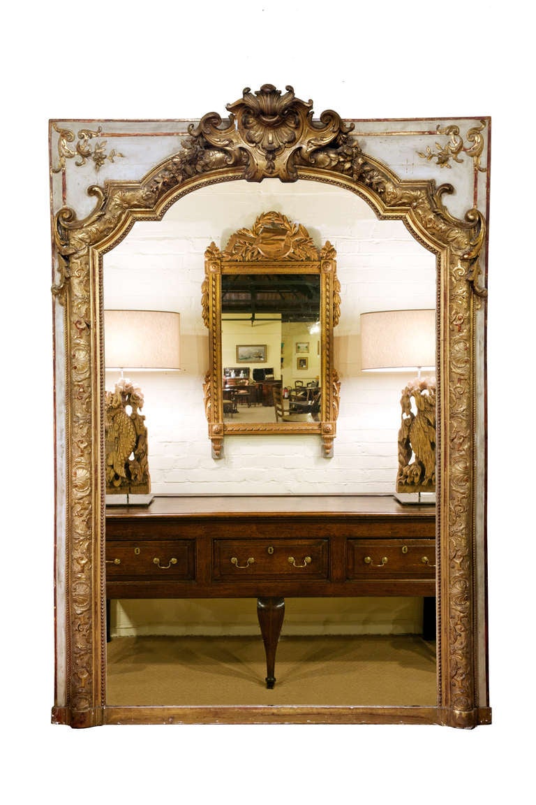 19th Century French overmantle gilt mirror with the original mercury plate.