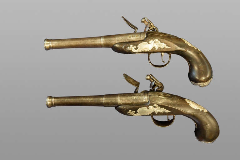 Fine pair of silver mounted Queen Anne style pistols by Nathaniel Trevey of London circa 1720.
In good overall condition, one frizzen spring replaced.

5