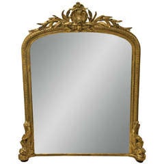English Gilt Overmantle mirror with Dolphin Supports
