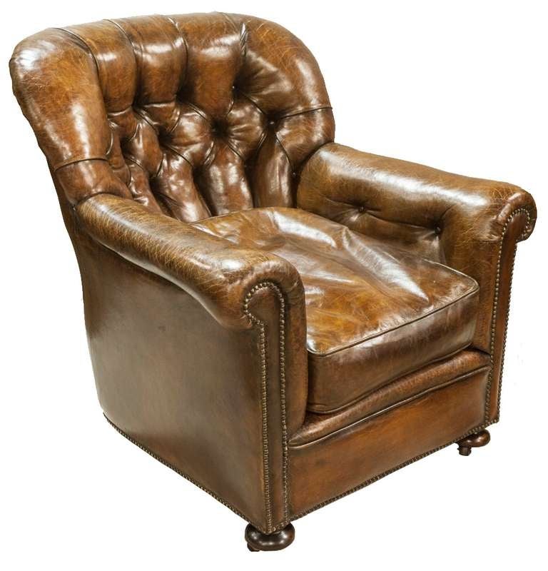 A large and extremely comfortable Victorian deep buttoned leather club chair traditionally upholstered and covered in Antique brown hide.

Circa 1880