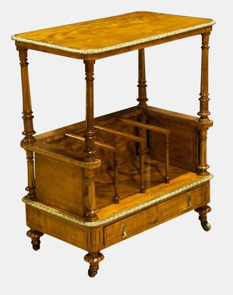 An exquisite Satinwood and ormolu mounted Canterbury whatnot of exceptional quality

Circa 1860