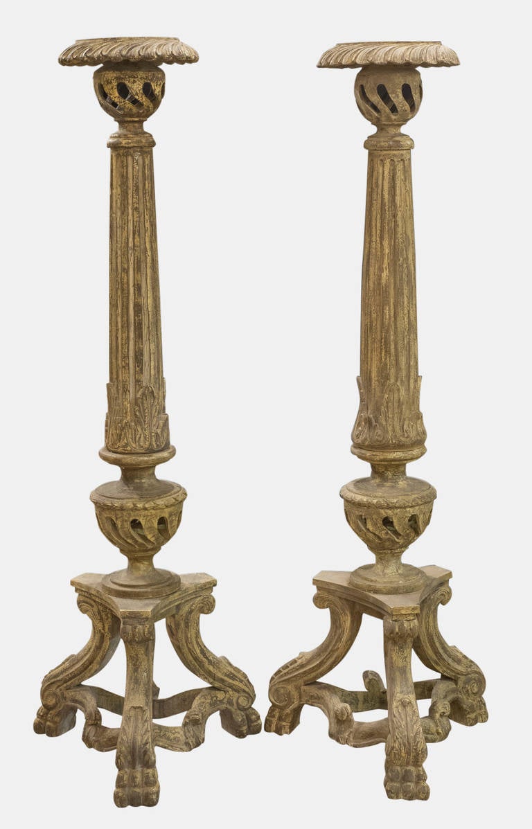A pair of Dauphine, Harrison & Gil candlesticks in Florentine wash.