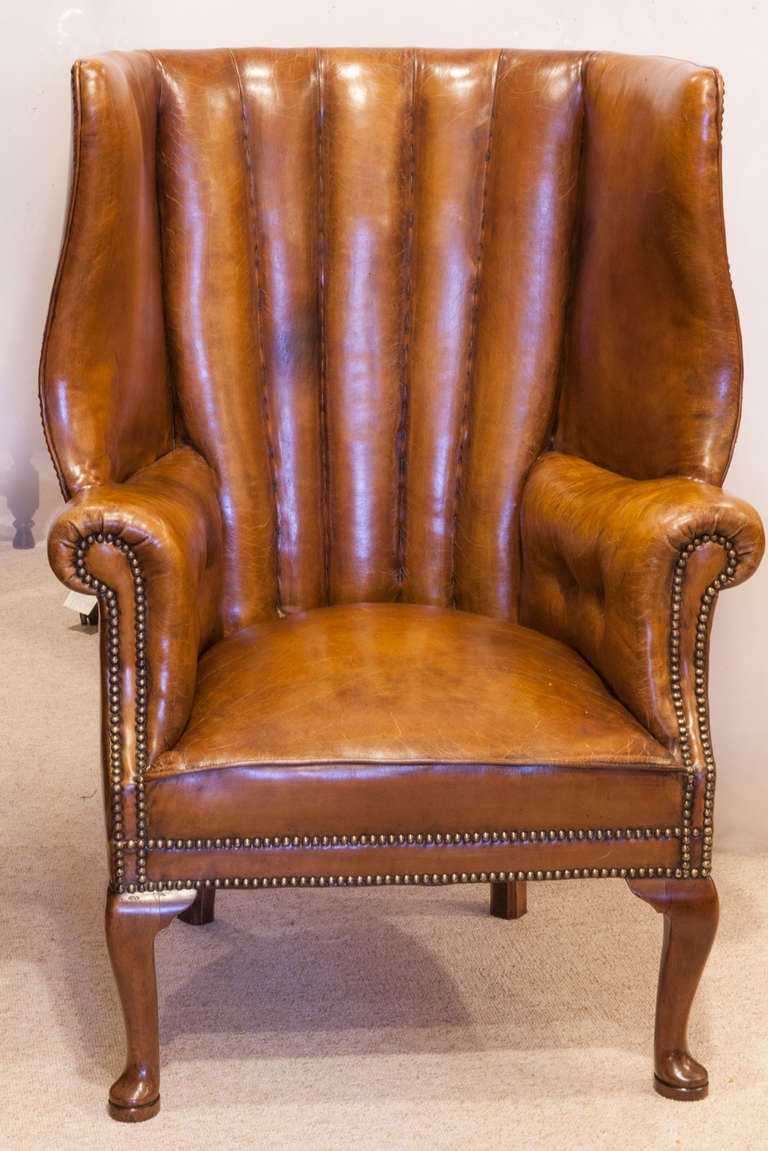A beautiful early 20th Century barrel backed heather gentlemans chair. Unusual and rare, on mahogany cabriole legs and pad feet

Circa 1920