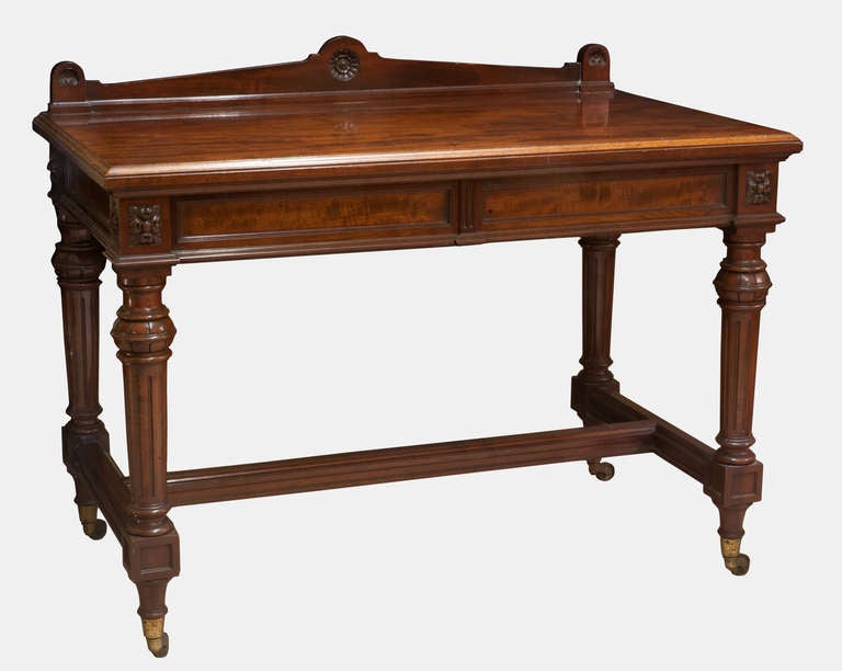 A superb quality mahogany hall table or planners desk of good proportions and beautifully figured timbers. 
Raised on an 'H' stretcher and reeded supports.
Stamped 'Gillows & Co'