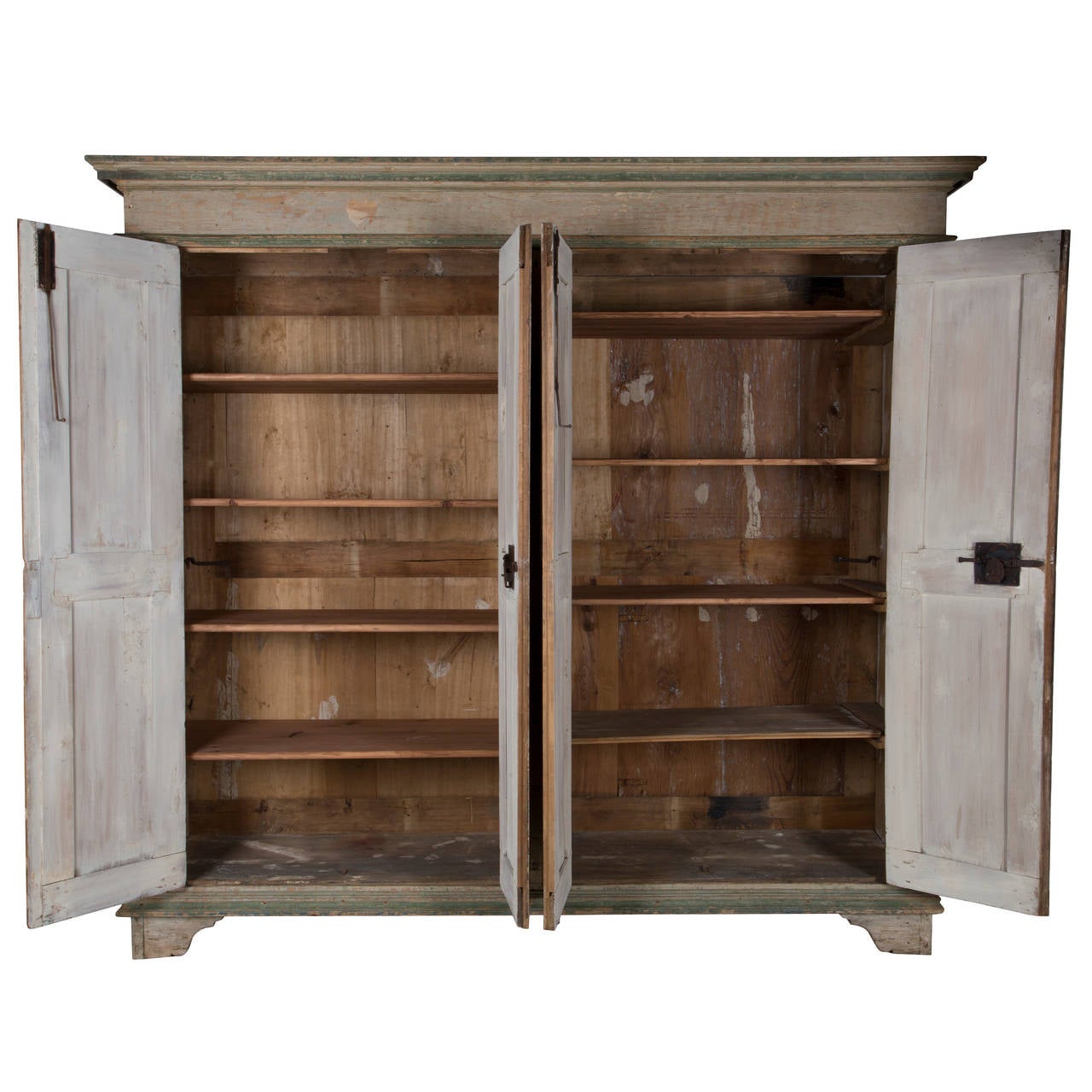 A rare, exceptional scale, Italian four-door cupboard scraped to original paint, circa 1800.