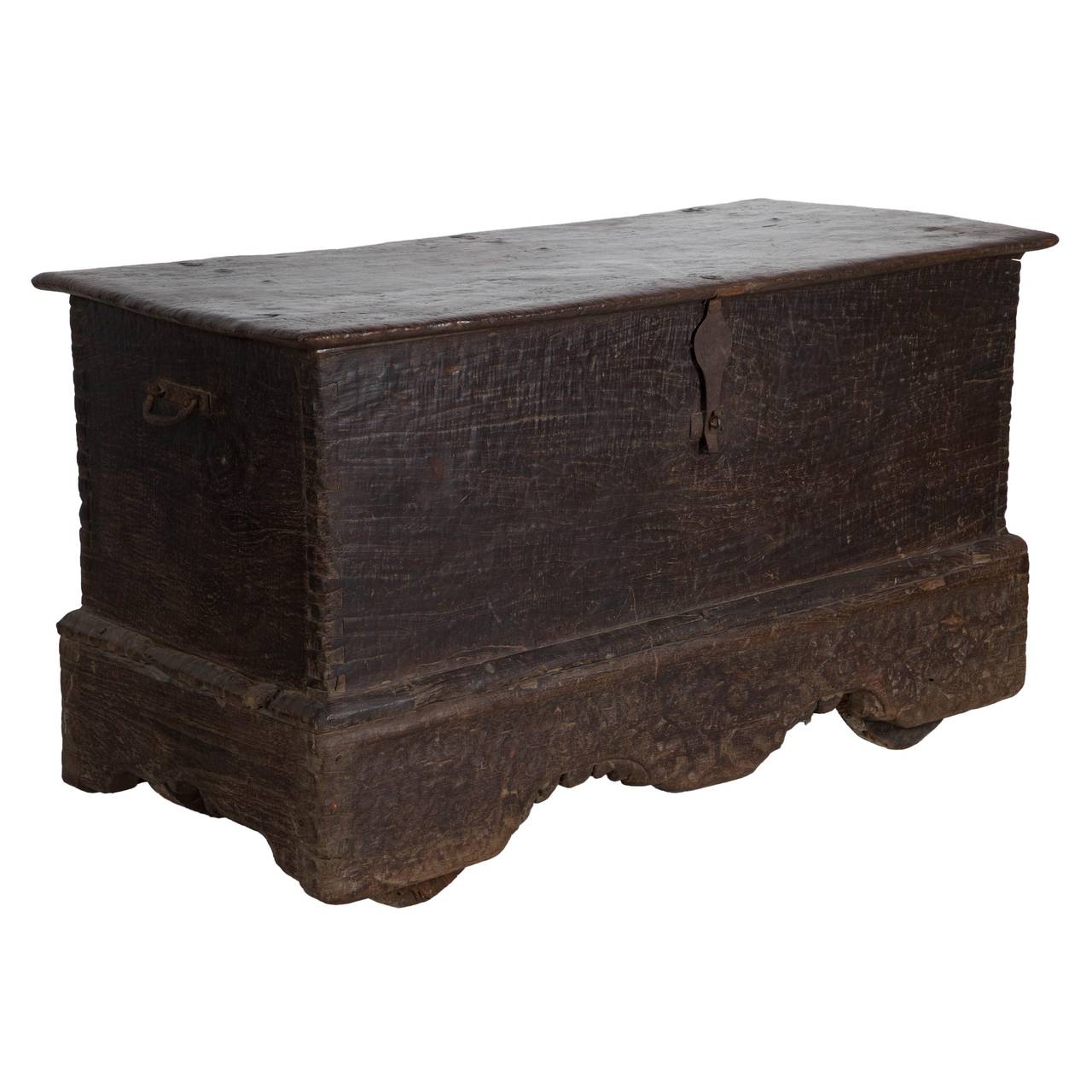 An impressive, large Sumatran coffer / chest with handles to either end and raised on four wooden wheels. Very naïve, rustic and heavy – probably made in a village, and very different from the usual ‘marriage chests’ found around Indonesia.  Late