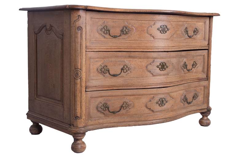A late 18th Century serpentine fronted inlaid oak commode with panelled sides c.1780.