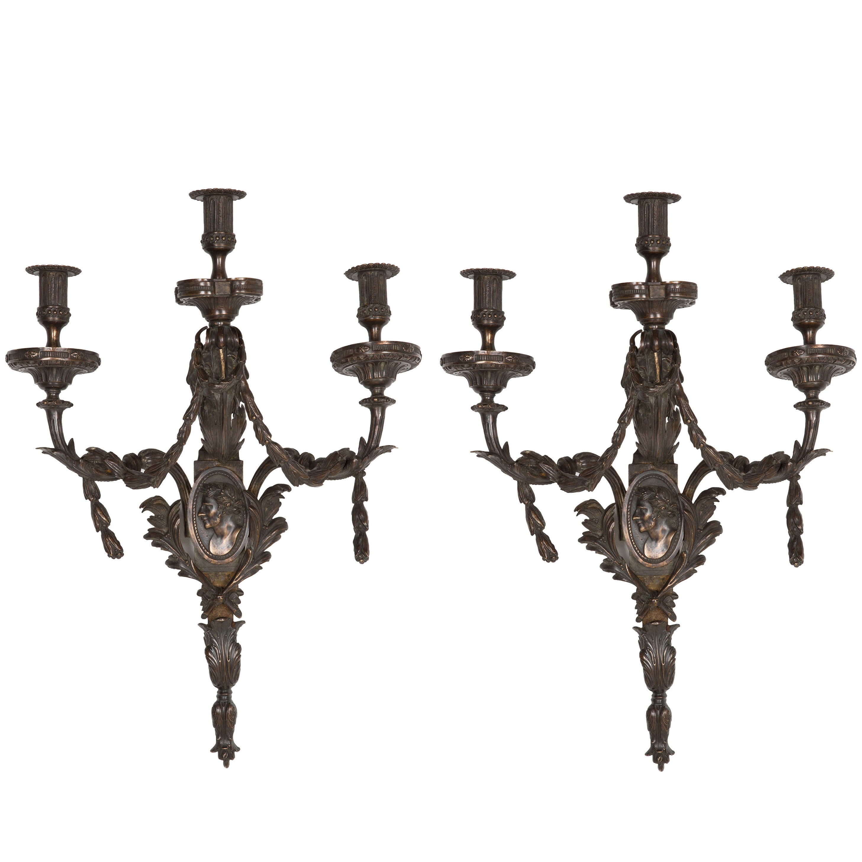 A Pair of Large Bronze Wall Lights