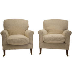 Pair of Howard and Sons Armchairs