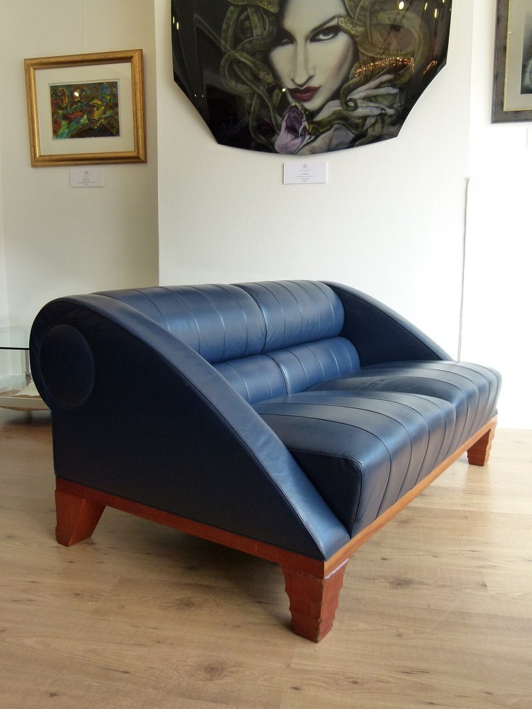 A beautiful example of the Aries sofa designed by Leon Krier circa 1993.

Produced by Giorgetti of Italy in the early 1990s.

Exceptional build quality, cherry frame, navy blue leather, interior sprung, inverted Pagoda legs.

A stylish