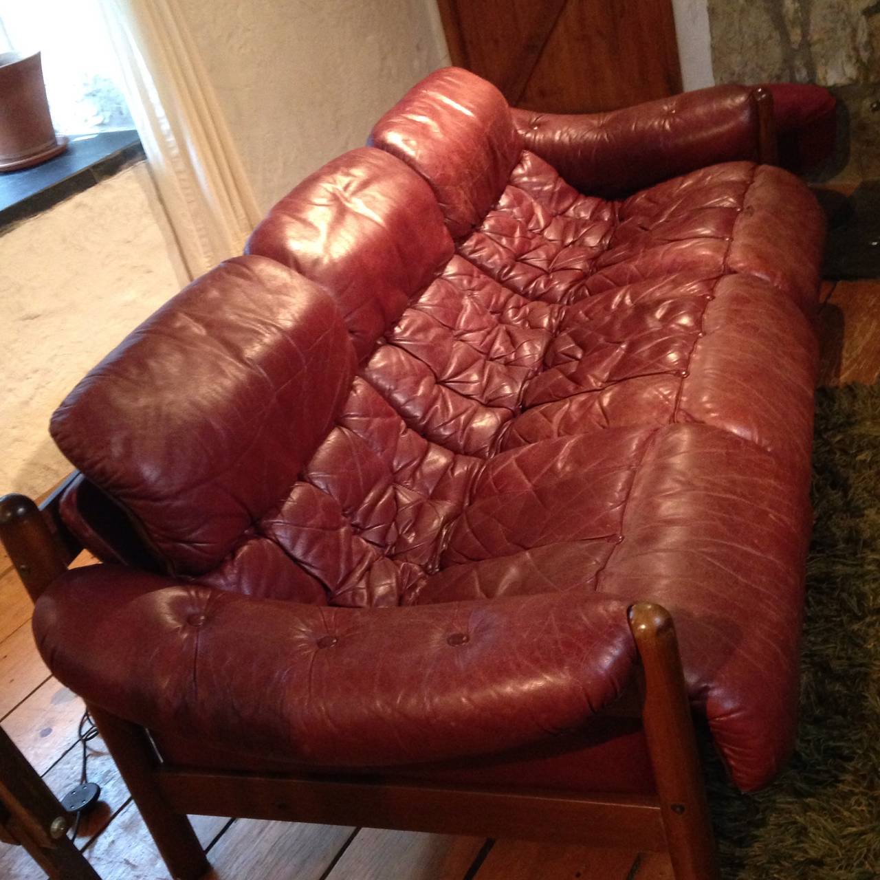 Vintage Danish Rosewood sofa with Oxblood leather c.1960's