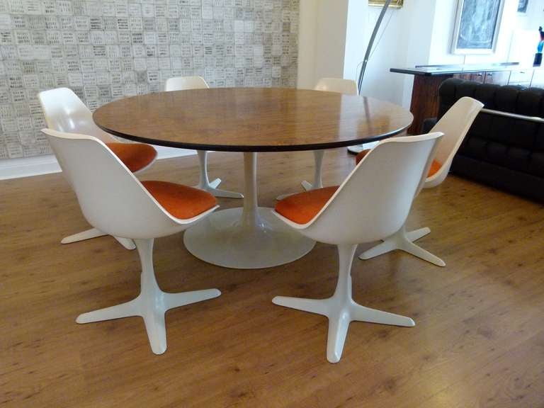 A stunning example of this classic Mid 20th Century dining suite.

Designed by Maurice Burke c.1965 for Arkana, England.

This table was the largest diameter Arkana made, comfortably accommodating six dining chairs. This example features a