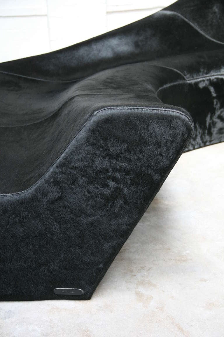 Stunning Moraine sofas designed by world-renowned architect Zaha Hadid circa 2000.

These examples are upholstered in black pony hide and were produced by Sawaya and Moroni of Italy circa 2004.

A true heavyweight offering, this pair of sofas