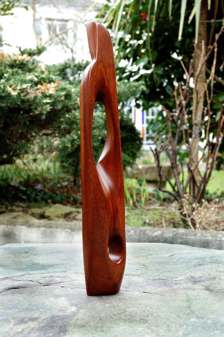 A beautiful contemporary abstract sculpture by British sculptor/painter Guy Eyres.

This piece is hand carved from Mahogany and stands 38cm high.

Beautiful in it's own right, or can be viewed as a maquette for a larger scale work in either wood