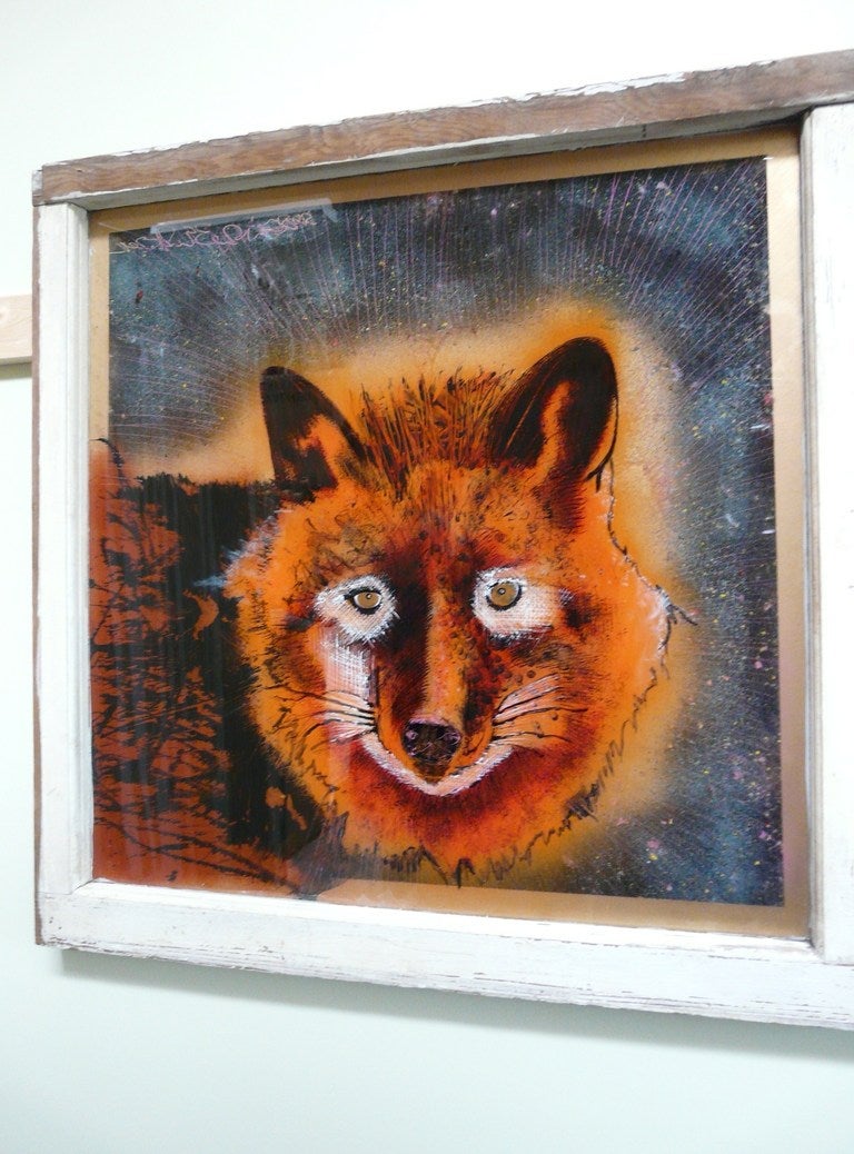 Wonderful reverse glass painting entitled Foxy Roxy by emerging young artist, Evan Peterson. 
The colors, technique, textures and image of this painting are striking - the fox peers out from the glass with a steady assessing gaze and despite the