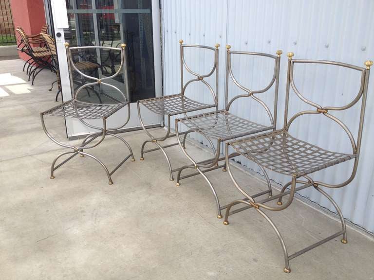 Four Polished Steel Jansen Style Campaign or Throne Chairs