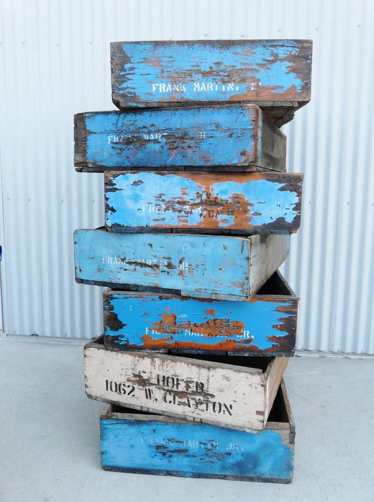 Fabulous collection of vintage sweat boxes from a Central California Valley vineyard, used for drying raisins and transporting grapes for the crush. Wonderful patina and weathering on the most beautiful cerulean blue , with one oddball crate in a