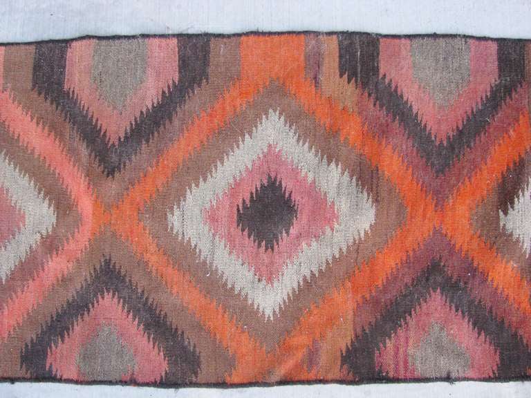 What a fabulous old textile this vintage Anatolian Turkish Wool Runner is with it's gorgeous and still bright vegetable dyed colors in a beautiful geometric diamond pattern, almost resembling a Navajo 'Eye Dazzler'.  Measures 11 feet 6.5