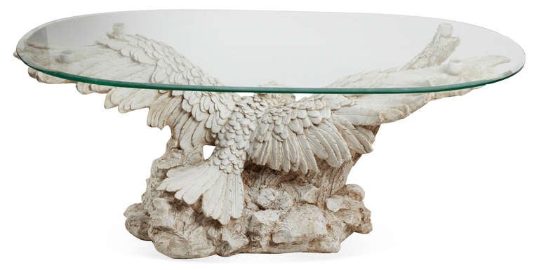 Oval glass coffee table with incredible eagle base.