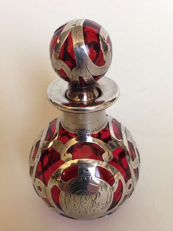 Fabulous popular red color glass by Steuben with the silver by Alvin Silver Co.
The color is so strong and the silver work very fine, this is a fine example.