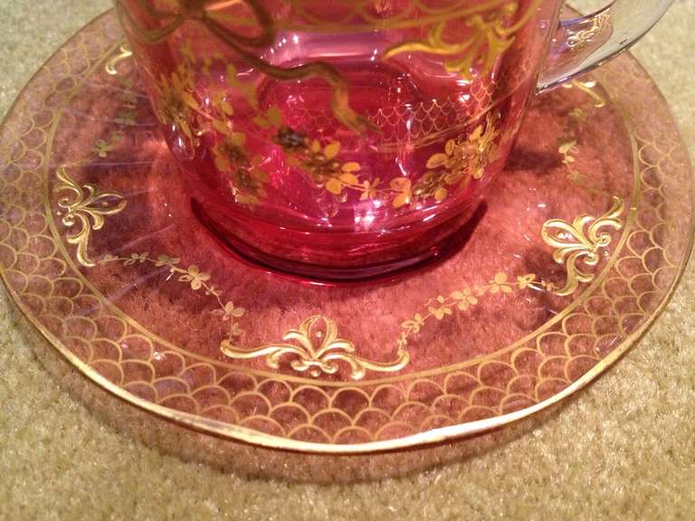 20th Century Moser Cranberry Cup And Saucer with Raised Gold Gilding c1900