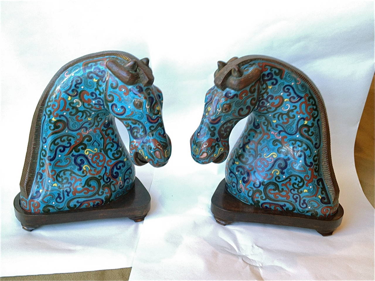 This pair is so decorative and will make a statement and add some animation. The colors and pattern are strong. Raised on their original hand-carved stands
and in excellent condition.