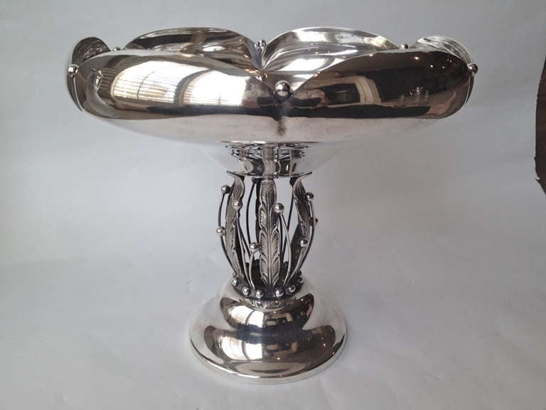 This stylish compote centerpiece is said to have been made by Hans Christensen, which makes sense as the design is much like his work 
at Jensen factory. It is a lovely piece that could serve as a decorative 
object on display.