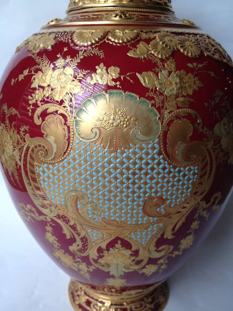 WOW! This is such a fantastic example of why Royal Crown Derby is widely considered some of the finest porcelain ever produced. The red color ground is
Breathtaking and all the enameling and amazing raised paste gilding is second to none. Also the