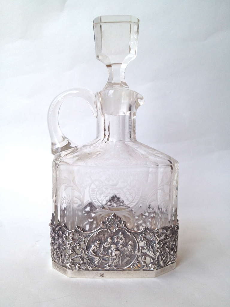Just waiting to join the other wonderful pieces on your bar or in the vitrine, the
Silver work is beautifully cast and chased and the glass etched with a lovely pattern. One small chip hard to notice, not to deter.