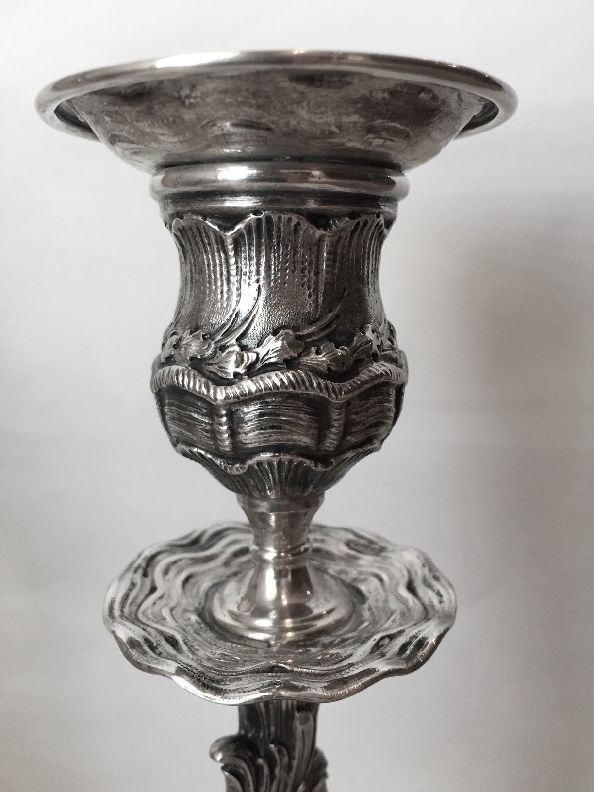Silver Impossible Set of Eight Putti Driven Dolphin Form Candlesticks, circa 1900