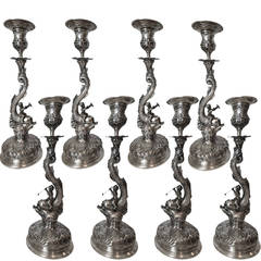 Impossible Set of Eight Putti Driven Dolphin Form Candlesticks, circa 1900