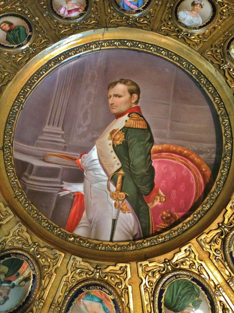 This museum Quailty porcelain portrait table, is the finest example of this model 
We have seen.  The portraits that in circle the main portrait are of the very finest Quailty available, the gilt wood portion is carved with gesso that is so well