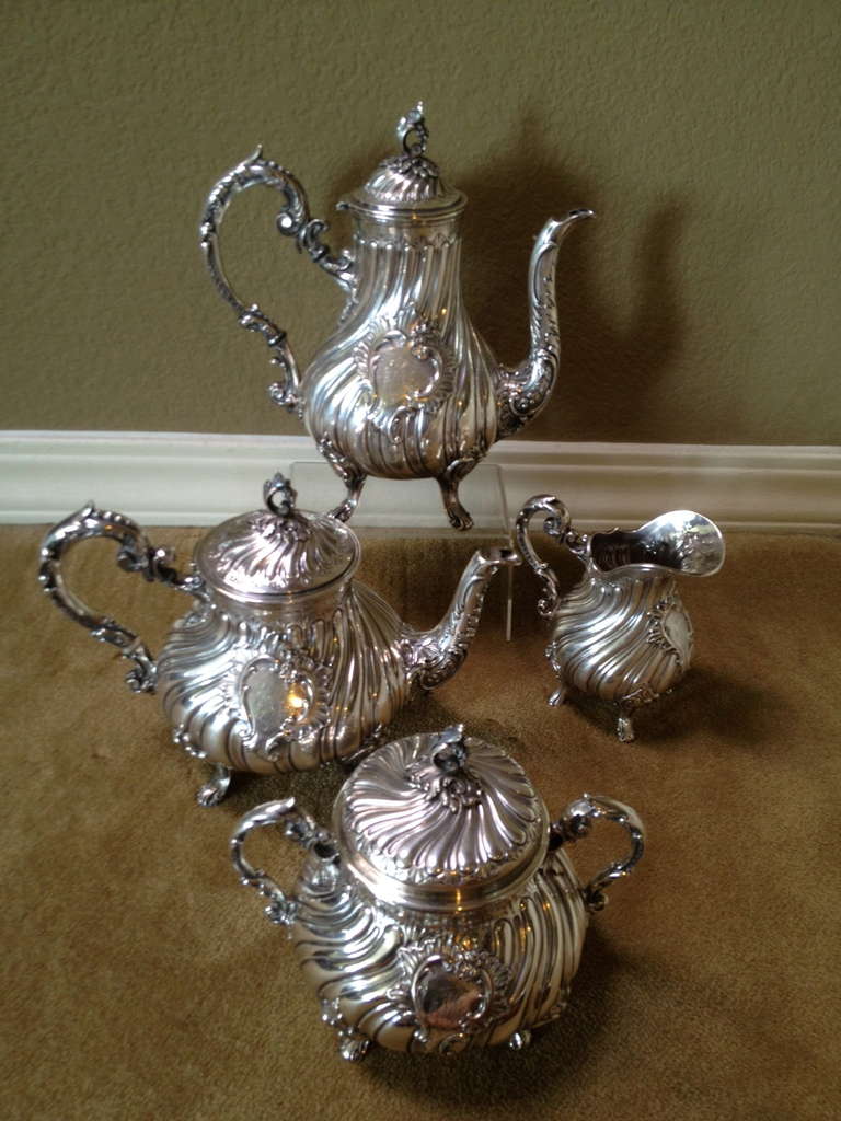 This is a fine 19th century French silver tea set the chasing and the design come together to make this set grab your attention. It is Classic in taste, nice weight and in beautiful antique condition a couple of dings, some under creamer lip.
Not