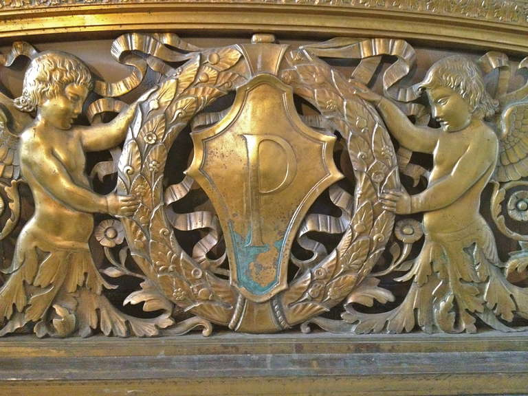 Fine and Monumental Gilt Bronze Transome From The Famous Phelan Building on Market Street in San Francisco. The piece is centered by a cartouche monogrammed with the letter P. the quailty of the casting is fabulous and the subject matter so