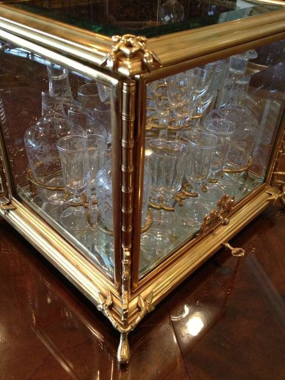 Fine Quality French Gilt Bronze and Crystal Tantalus Set c.1890
Fitted with the original bottles and a nice solution for the many glasses now serving the tantalus. it is acceptable now a days to complete these sets as found to again make them