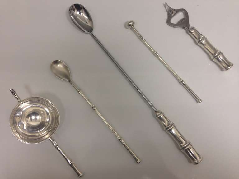 This five piece sterling Tiffany and Co. five piece bar set is a great find ready to take a prominent position on the perfectly appointed bar. You will be so proud to serve your guests in style with this fine set. Somewhere in the world it's always