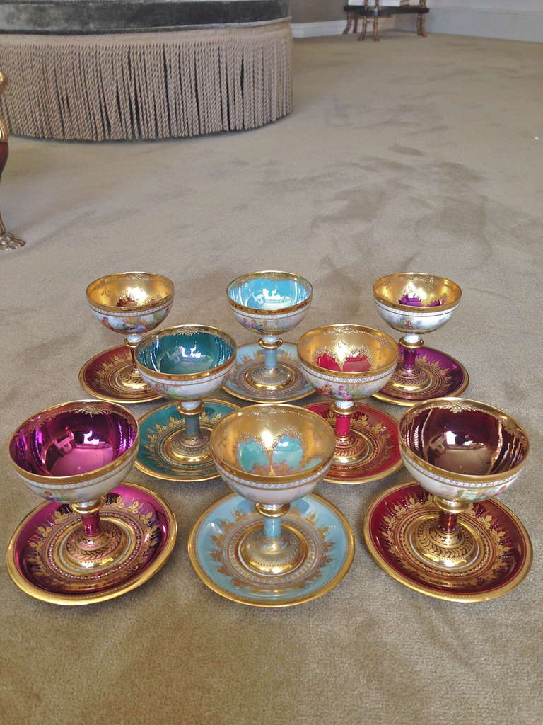 This set of twelve beautiful Handpainted and raised paste gilded compotes with the very special and extremly rare Iridescent glazes, the quailty is fantastic. There is a saucer lacking and I commit to finding a suitable replacement saucer in my