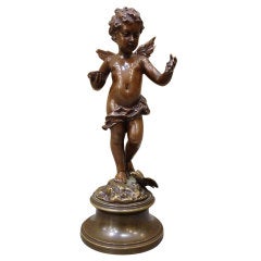 Charming and Finley Cast Miniature Bronze of Cherub Feeding a Bird 19thc.