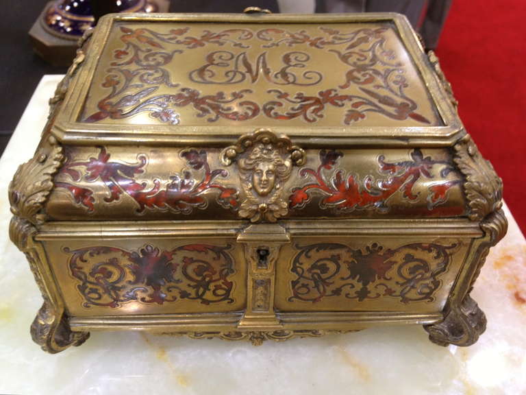 The Boulle box with nice bronze mounts is a nice example of the work in the Grand Tour period. Finely cast are the bronze mounts that cover the box generously. It just has a wonderful look showing
 It has been around servicing its owners over its