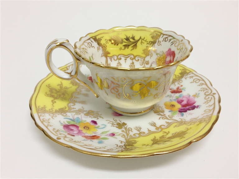 A delightful set of demitasse cups by Cauldon. The ground color of yellow with beautiful flowers painted on the saucer and the interior of the bowl. The set was retailed originally at Gilman and
Collamore & Co.

Thank your for your interest and