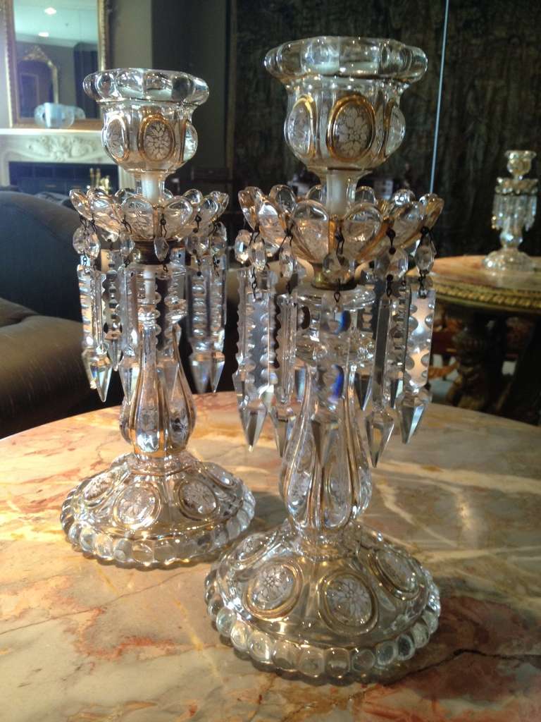 Possibly the most popular model of these versatile decorative and functional 
candlesticks for us over the years, the offered pair is in wonderful condition and
Are of finest quality available. These can be electrified easily as they are