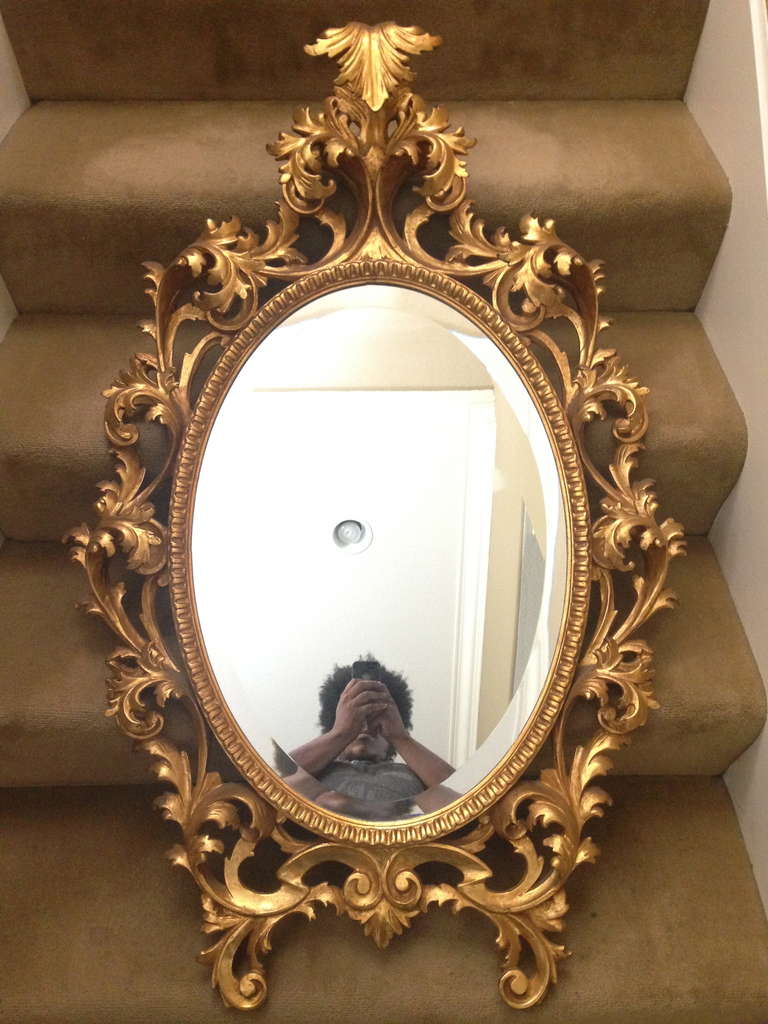Wow what an impact piece, imagine your beautiful clock set setting on the mantel with this fabulous mirror behind it. This beautiful mirror would be fine located anywhere else in your home instead. The color is lovely. And the condition is excellent.