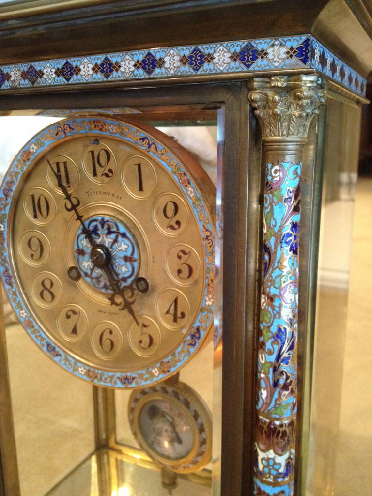 This beautiful clock is from Tiffany and Co. The best, The condition is excellent.
Champleve enamel and gilt bronze the perfect combination, very colorful and easy to associate with a pair of urns or vases to complete your mantle setting.
The
