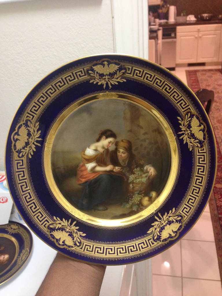 Vienna style plates painted after famous portraits and scenes, the quality exceptional they were produce by the director of the KPM factory under his own studio as marked on the reverse. These are rare and very desirable.