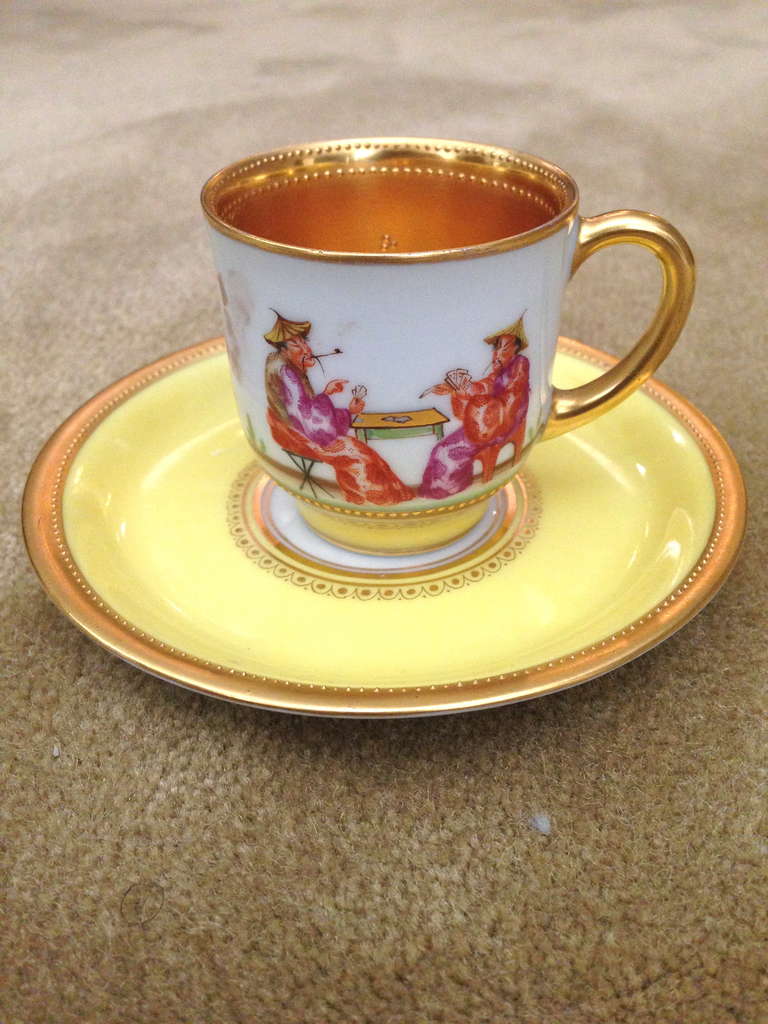 A wonderful example colorfully painted with a chinoiserie scene
The entire interior of the cup is covered in gold gilt and even has a raised dot pattern. All signed for Lamm Dresden one of the finest of the period at porcelain decoration.