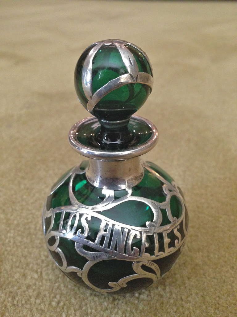 This is special, we have never seen one of these with the name 
of any city, and since we show there 5 times a year this will go fast. This was probably ordered by a jeweler as a prop as these
bottles were offered at the finer jewelry shops of